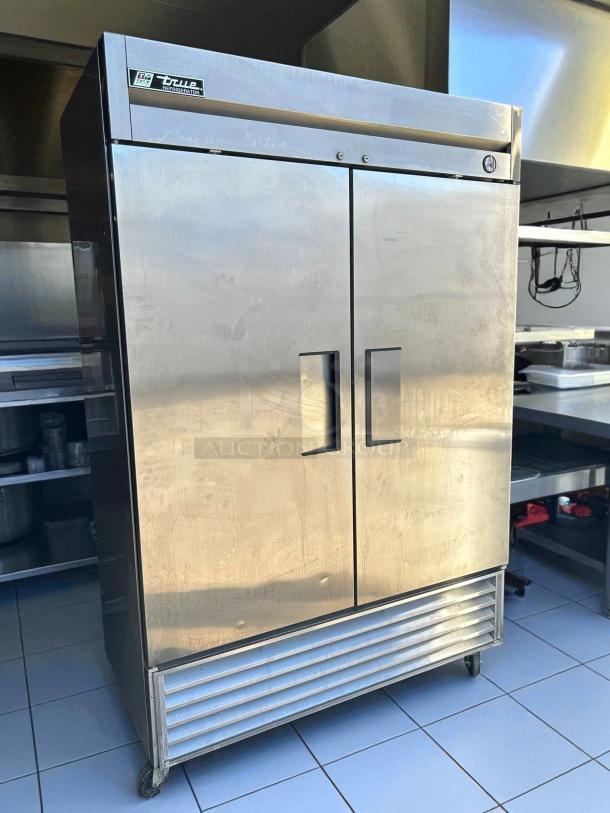 True T-49-HC solid door reach-in refrigerator, stainless steel, tested and working, model label visible, excellent condition.