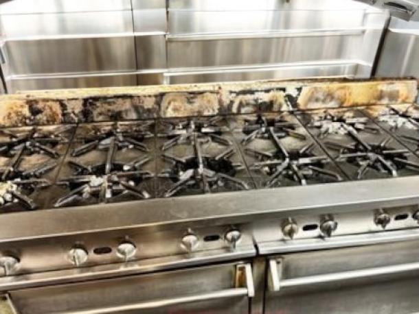 Southbend 4601DD 10-burner gas range with 2 ovens, natural gas, tested, in good working condition. Includes control knobs.