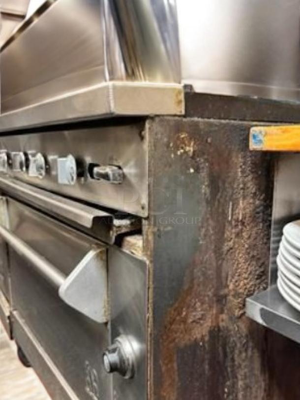 Southbend 4601DD 10-burner gas range with two ovens, natural gas, good working condition, visible wear on side.