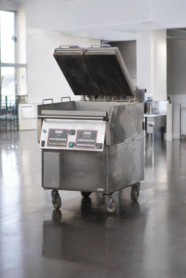 Superb condition Garland Xpress Grill XE36, electric dual platen, 208/240V, tested, stainless steel, wheeled base.