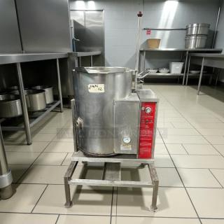 Groen TDH-48C 12 gal. steam kettle, manual tilt, 2/3 jacket, natural gas, tested and working, industrial kitchen setting.