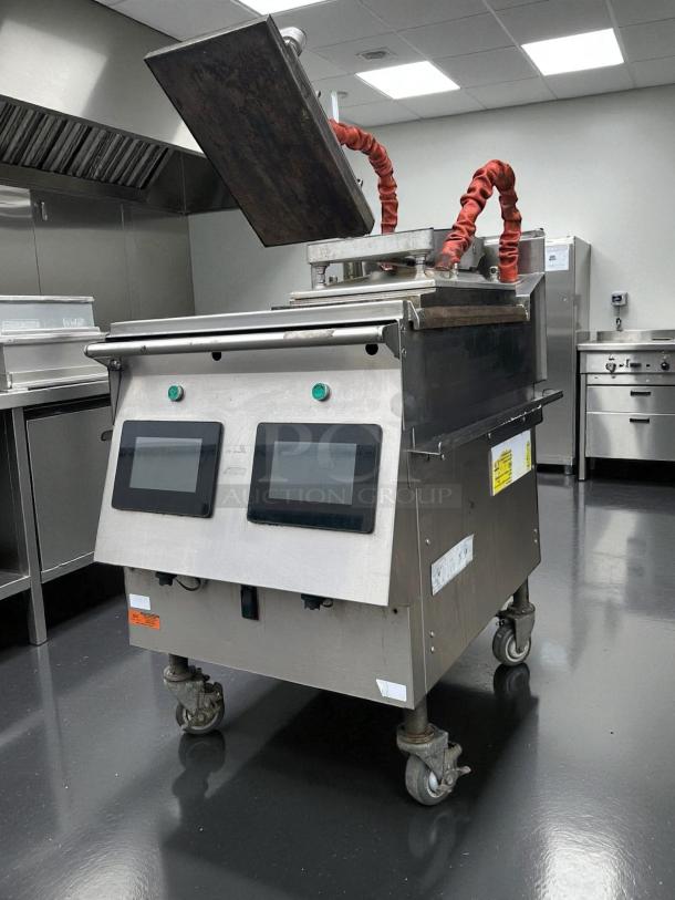 Garland US Range XPG24 gas flat griddle, excellent condition, dual control panels, mounted on casters, tested and working.