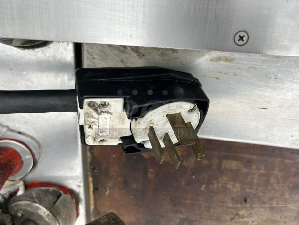 Garland XPG24 gas flat griddle plug view, showing three-prong connection, tested and working condition, minor wear visible.