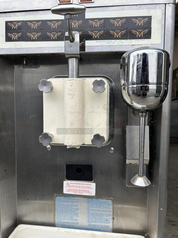 Taylor Model 490 countertop shake freezer, single flavor, excellent condition, tested and working, visible caution and manufacturer labels.