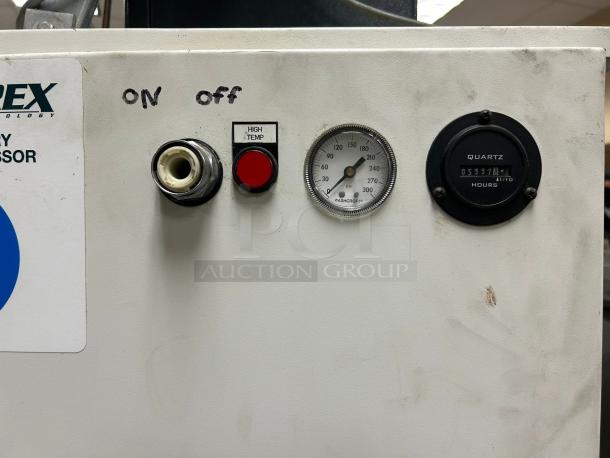 Turbo Air TSU-4RW-N6 vaccine refrigerator controls, gauge, and Quartz hour meter. Visible "ON/off" and "HIGH TEMP" markings.