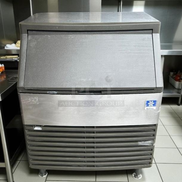 Manitowoc QD-0272A ice machine, undercounter, 280 lb. production, 100 lb. storage, tested, working, compact, stainless steel.