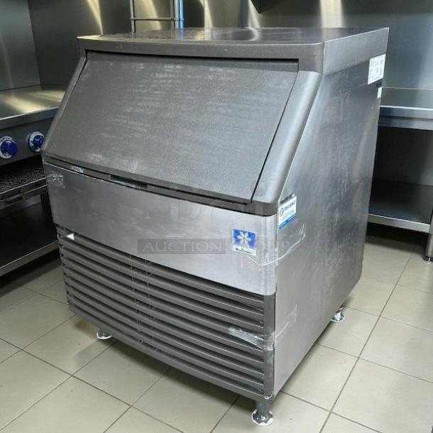 Manitowoc QD-0272A undercounter ice machine, 280 lb. capacity, stainless steel, 100 lb. storage, tested and working.