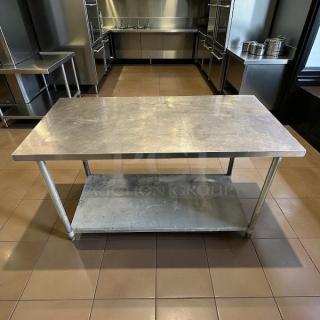 GSW USA WT-P3060 stainless steel work table, 30" x 60", excellent condition, features durable surface and lower shelf.