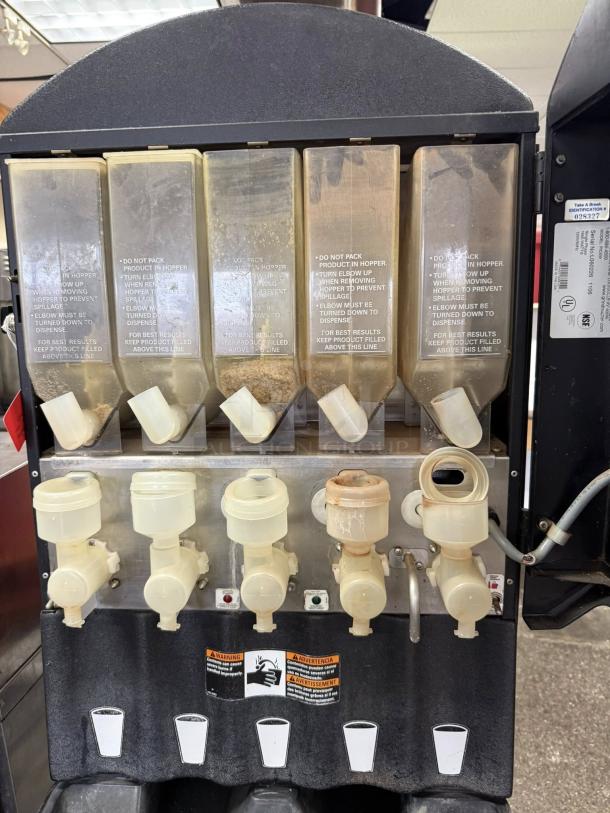 Grindmaster PIC5 powdered beverage dispenser, five flavor capacity, excellent condition, tested and working, visible instructions.