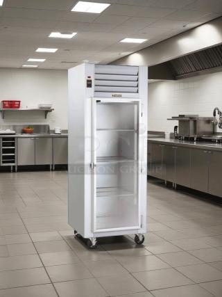 Traulsen G11010 30" G Series Reach-In Refrigerator with right-hinged glass door, tested and working, on casters in a kitchen.