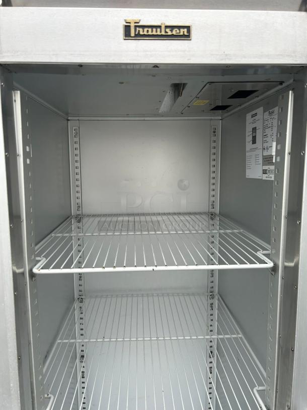 Traulsen G11010 30" G Series reach-in refrigerator with interior wire shelves, tested and working. Right-hinged glass door.