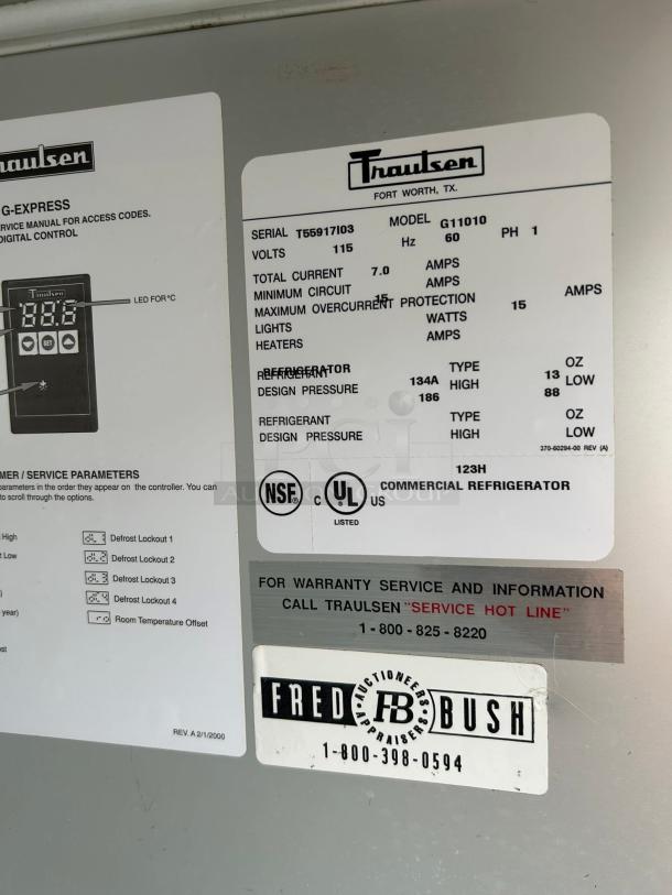 Traulsen G11010 refrigerator label shows model, serial number T55917103, 115 volts, 134A refrigerant, NSF and UL listed.