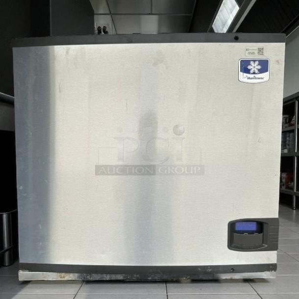 Manitowoc IYT0900A ice machine head, 865 lb capacity, air-cooled, half dice, tested and working. Stainless finish, visible label.
