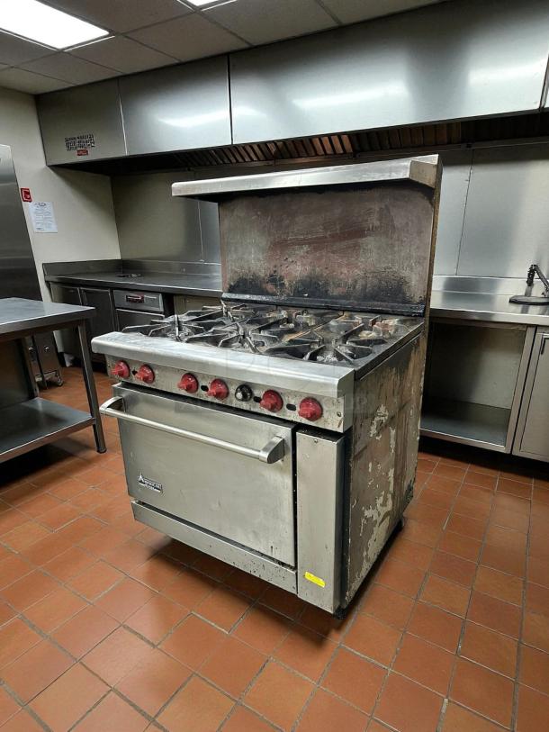 American Range AR-6 36" commercial gas range with six burners and standard oven. Good condition, tested and working.
