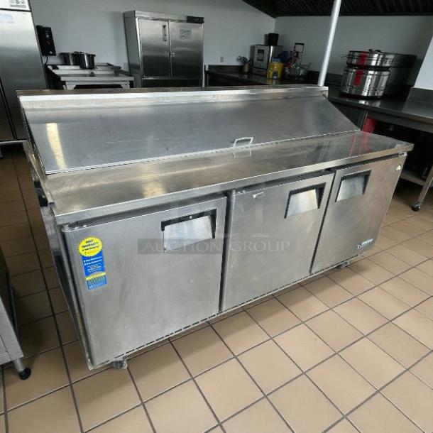 Everest Refrigeration EPBNR3 71 1/8" sandwich/salad prep table with refrigerated base, stainless steel finish, tested working.