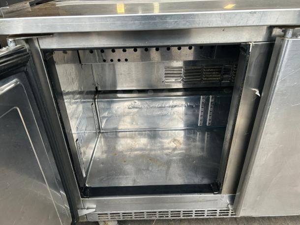 Everest Refrigeration EPBNR3 prep table, stainless steel, open door showing clean interior, 71 1/8", tested, working.