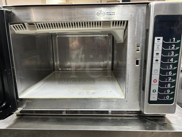 MENUMASTER MFS18TS commercial microwave oven in great condition, 208-240V, 60Hz. Features keypad controls, stainless interior.