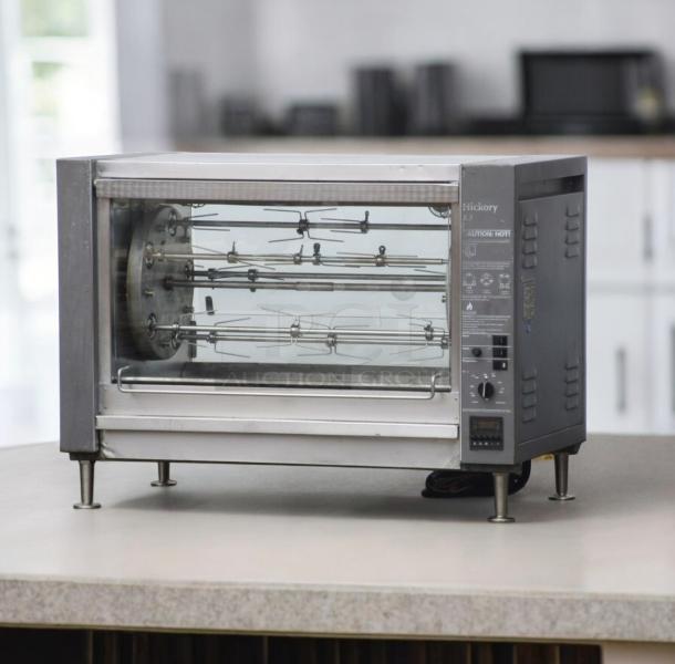Excellent condition Hickory N/5.5 E electric rotisserie oven with 5 spits, tested and working, stainless steel exterior.