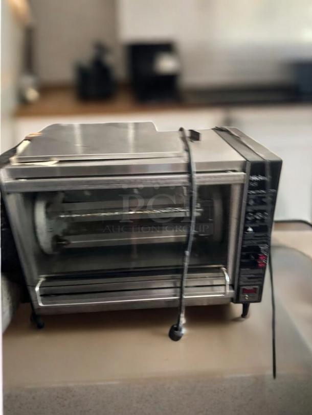 Hickory Industries N/5.5 E electric rotisserie oven with 5 spits, in excellent condition, tested and working.