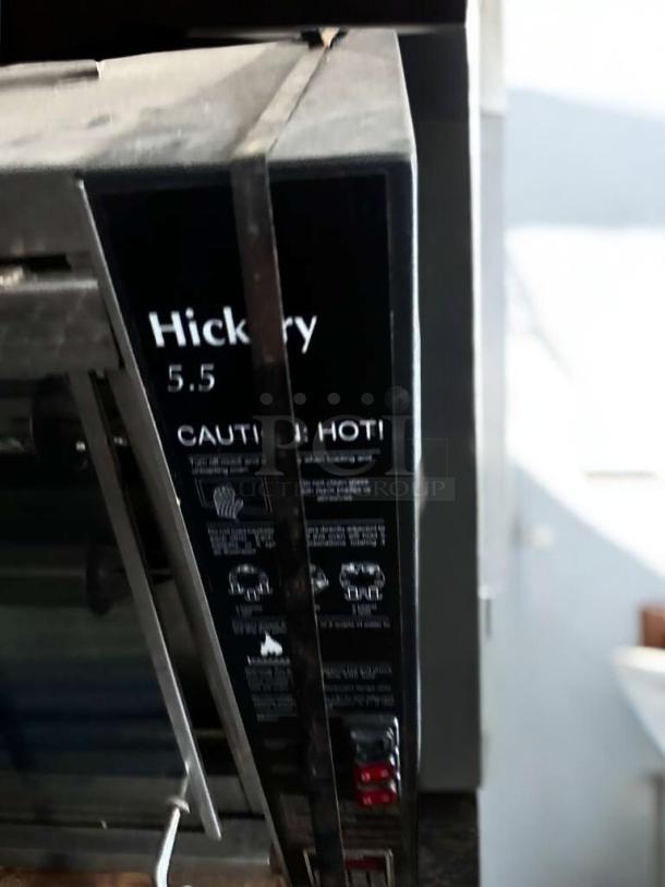Hickory N/5.5 E Electric Rotisserie Oven, excellent condition, 5 spits, tested and working. "Caution: Hot!" label visible.