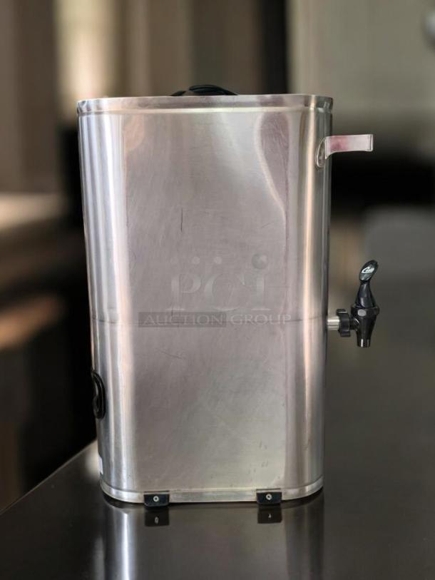 Curtis TLXA2201G Iced Tea Dispenser, stainless steel, excellent condition, round shape with spigot, tested & working.