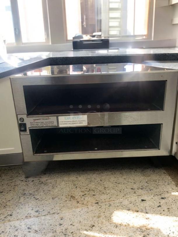 Henny Penny HCS-123 heated holding cabinet in excellent condition. Stainless steel, tested and working with visible control panel.