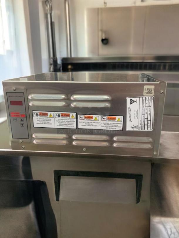 Henny Penny HCS-123 heated holding cabinet, stainless steel, excellent condition, tested and working, safety labels visible.