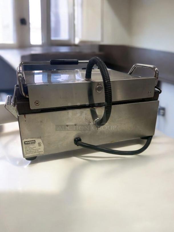 Waring Commercial Panini Supremo Sandwich Grill, stainless steel, excellent condition, tested and working, visible label.