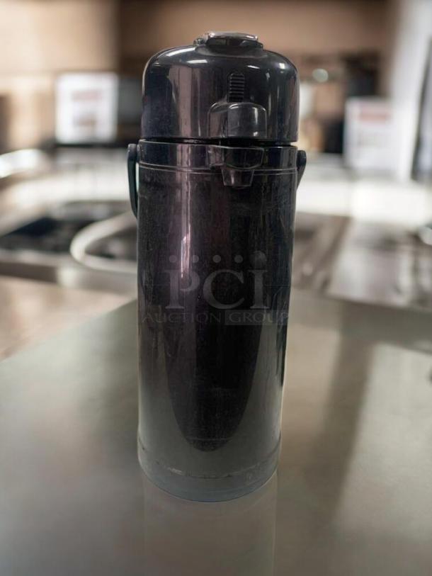 BUNN Airpot Coffee Server, black, push-top dispenser, excellent condition, tested and working.