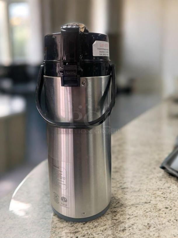 Java Classics Colombia Supremo Airpot in excellent condition, silver with black handle, light roast branding, tested and working.