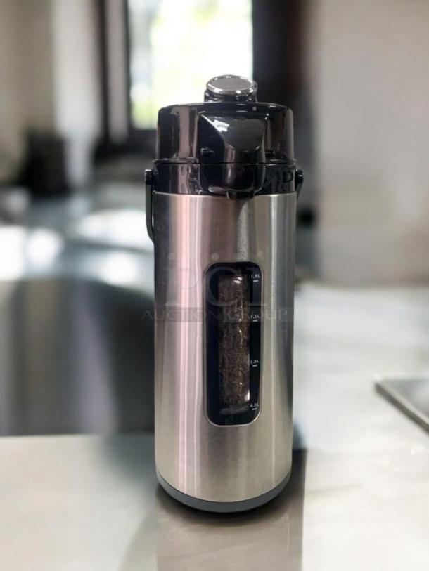 Java Classics Colombia Supremo Airpot Coffee Server in stainless steel, excellent condition, tested and working, light roast branding.