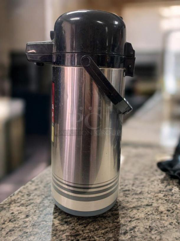 Java Classics Colombia Supremo Airpot Coffee Server in excellent condition, stainless steel with light roast branding, tested and working.