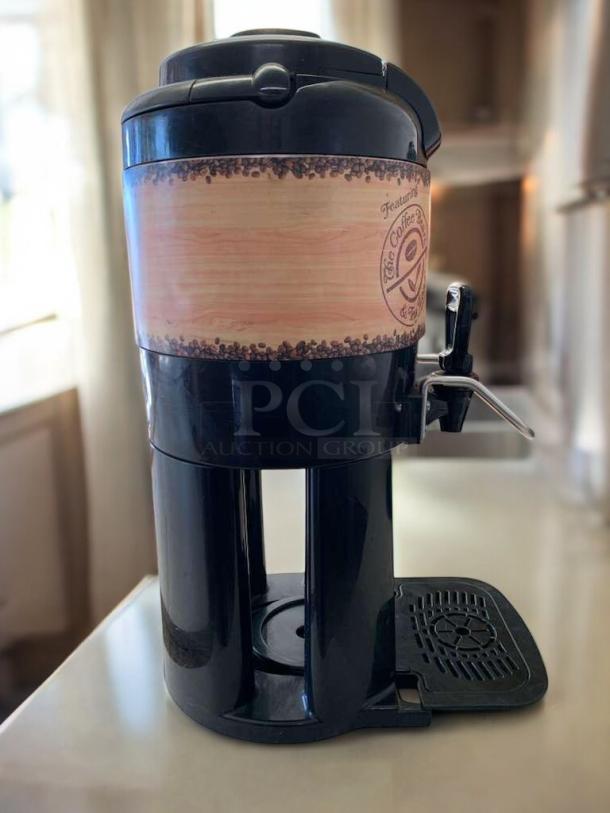 Curtis ThermoPro TL3601 hazelnut coffee dispenser in excellent condition, tested and working, features decorative coffee label.