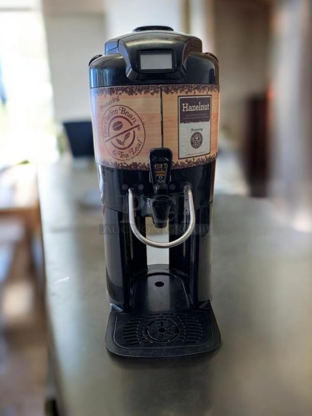 Curtis ThermoPro TL3601 Hazelnut Coffee Dispenser, excellent condition, tested and working, featuring branded labels.