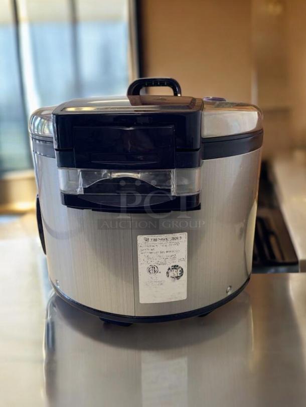 Zojirushi THS-15S commercial rice warmer, excellent condition, stainless steel finish, tested and working, visible label.