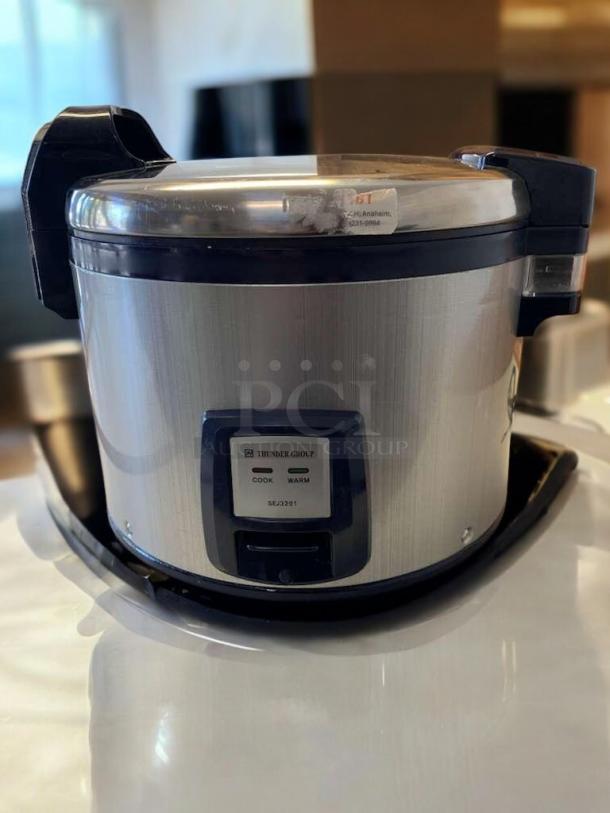 Zojirushi THS-15S rice warmer, stainless steel, excellent condition, tested and functioning. Features cook/warm indicators.