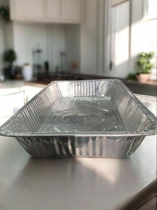 Full-size aluminum foil steam table pan in excellent condition. Generic commercial grade, suitable for catering use.