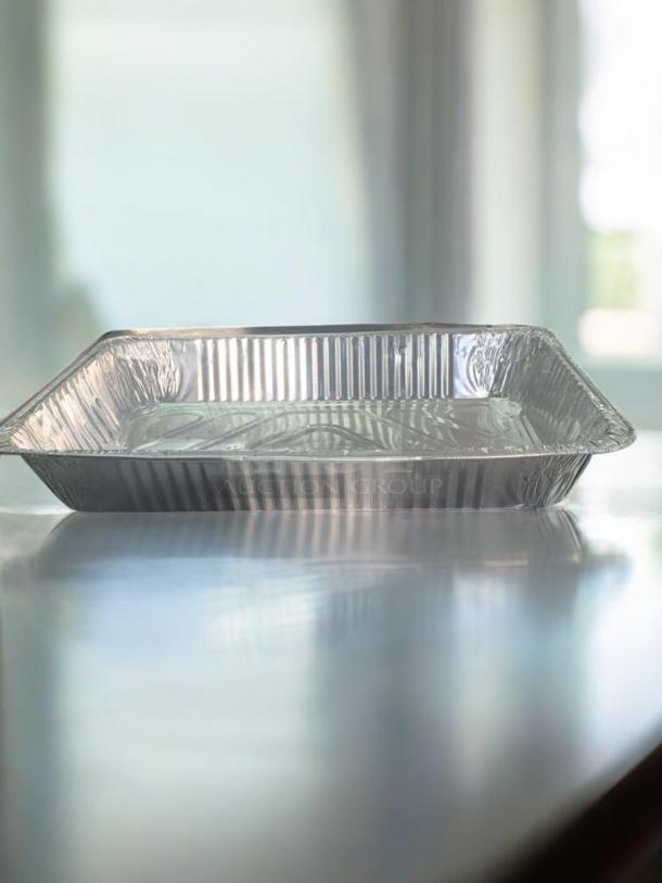 Full-size aluminum foil steam table pan, in excellent condition. Generic commercial grade, disposable catering tray.