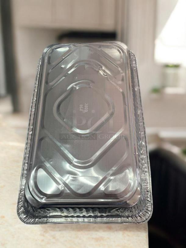 Full-size disposable aluminum steam table pan, excellent condition, generic commercial grade, ideal for catering use.