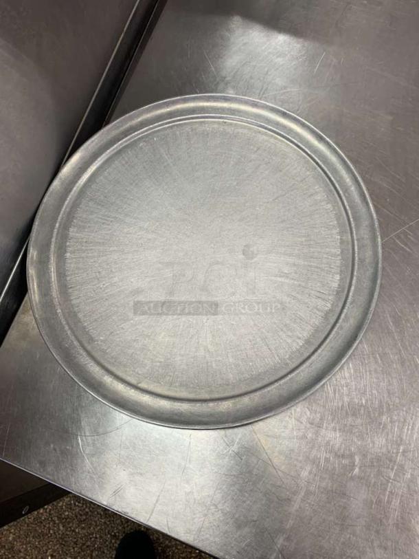 Universal Commercial Bakeware 16-Inch Round Aluminum Pizza Pan, commercial grade, in good condition, plain design.