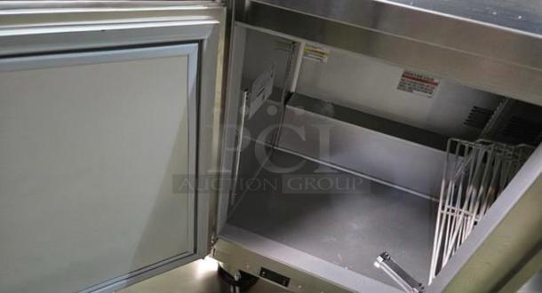 Immaculate Beverage-Air WTR72AHC-FIP worktop refrigerator with 3 sections, interior view, stainless steel, fully tested.