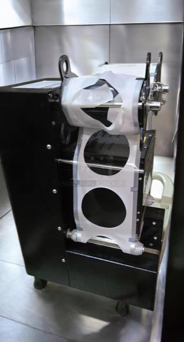 Outstanding condition WantJoin WZ-95B automatic cup sealing machine, 110V, tested and working, includes film roll.