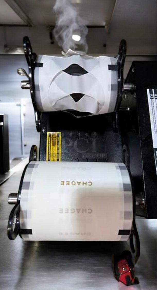 WantJoin WZ-95B automatic cup sealing machine, excellent condition, 110V, tested and working, with labeled rolls visible.