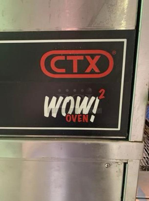 Middleby Marshall CTX DZ33T Triple Deck Infrared Conveyor Oven in superb condition, 208V, with "WOW! Oven" label.