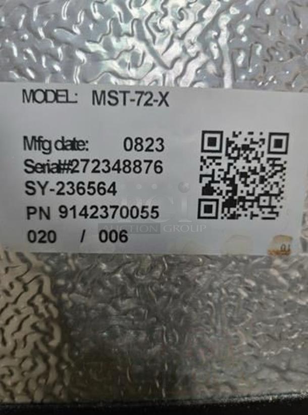 MoTak MST-72-X refrigerated prep table in immaculate condition with visible label showing model, serial number, and QR code.