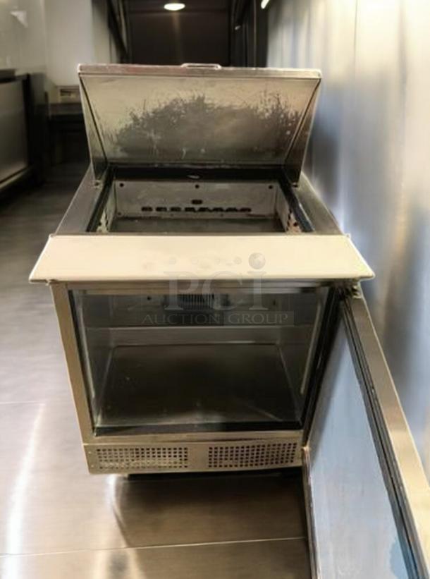 True TSSU-27-08-HC 27" sandwich/salad prep table in outstanding condition, stainless steel, with open lid, tested and working.