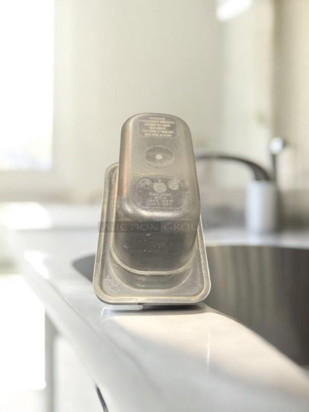 Commercial grade 1/9 size, 4" deep polycarbonate food pan, excellent condition, NSF approved, tested and cleaned.