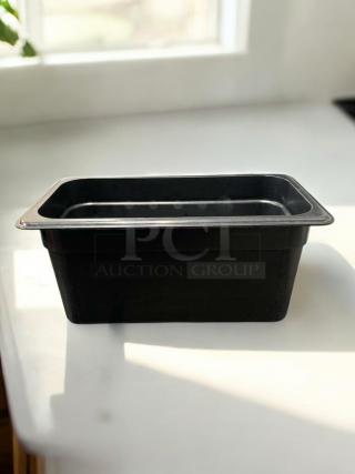 Black Cambro/Carlisle 1/9 size food storage container, 4" deep, NSF polycarbonate, excellent condition.