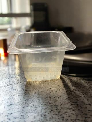 Clear 1/6 size food storage container, 6" deep, NSF polycarbonate, in excellent condition, compatible with Cambro/Carlisle.