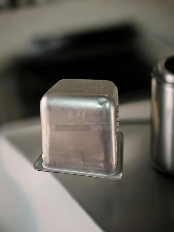 1/6 Size 6" Deep Stainless Steel Steam Table Pan in excellent condition. NSF Certified, compatible with Cambro/Vollrath/Winco.